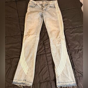 Stylish Light Blue Jeans with White Stripes